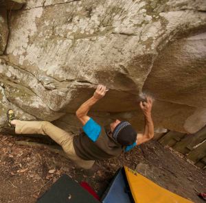 Cold weather is best for bouldering, so make sure you dress appropriately, like Mike on Tennessee Thong, V7, Little Rock City, TN.