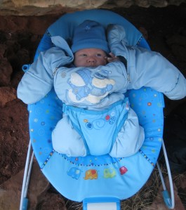 An oversized "bunting" like this will work for newborns, but still fit nearly a year later. Sleeves aren't essential at first, but once baby is 3 months old or so they're nice to have.