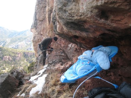 Logan perched under a low roof at Shelf Road to protect from rock fall.