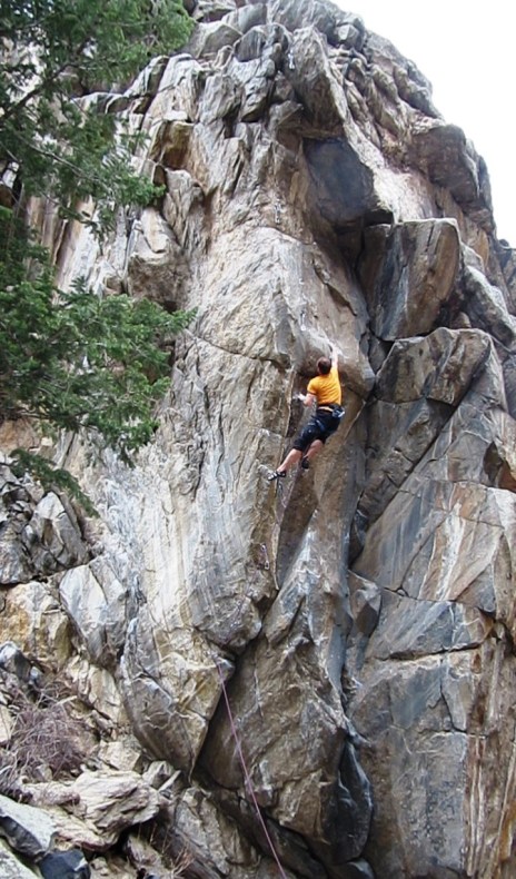 The crux throw.  My left hand is on the pivotal hold.