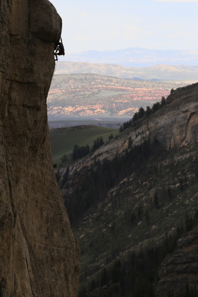 Las Vegas climber, and all-around awesome dude, Rob Jensen climbing "Dominant Species" 5.11d. That's Red Canyon in the background.