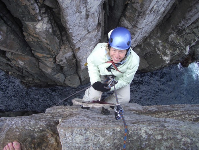 Kate arriving at the summit ledge.