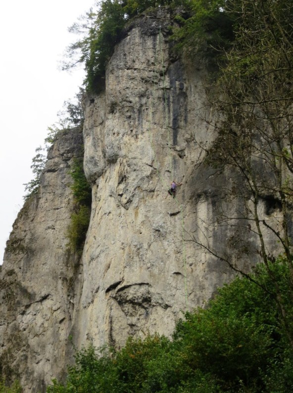 Kate climbing 40-meters of gently overhanging 5.10 pockets at Roter Fels