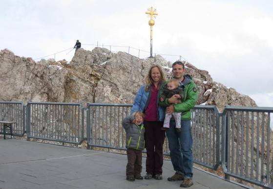 On the summit plaza, with a climber nearing the actual summit of the Zugspitze.