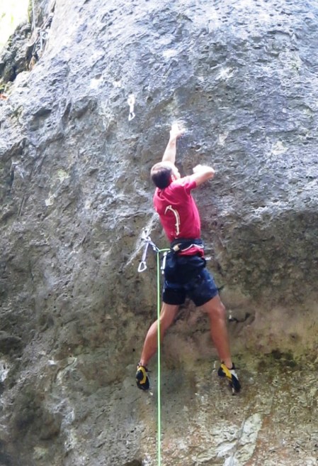Latching the incut two finger. Now I just need to throw my foot up to my armpit, lock-off the pocket to my kneecap, and dyno precisely into a half-pad mail slot!