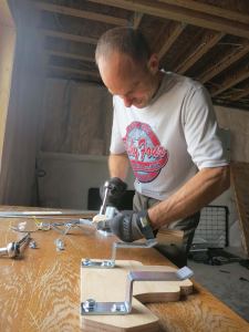 Torquing the bolts into the T-Nuts.