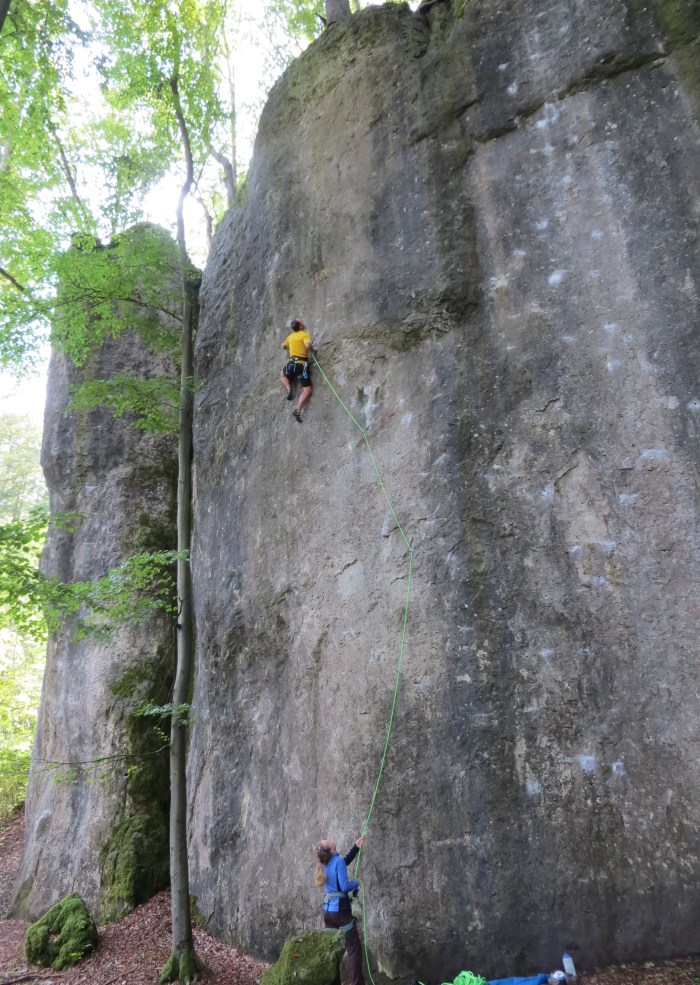 Dealing with some thin, slippery footholds on the crux of Team Motivation. Photo Logan Anderson. 