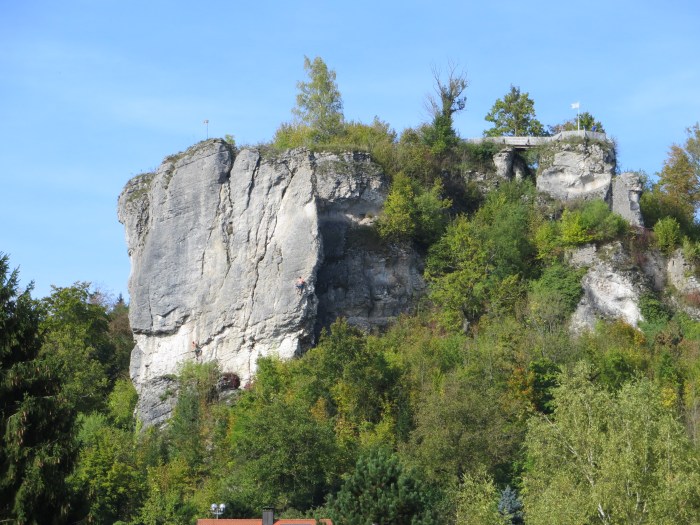Streitberger Schild, with a couple of climbers heading up some old-school steep slab routes.