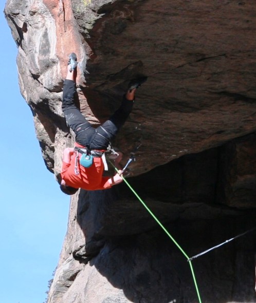 Pulling the lip, feet first and almost completely inverted.  Photo Mike Anderson.