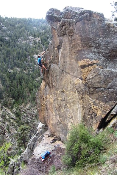 Climbing the exposed southern arête of the Sharks Fin.