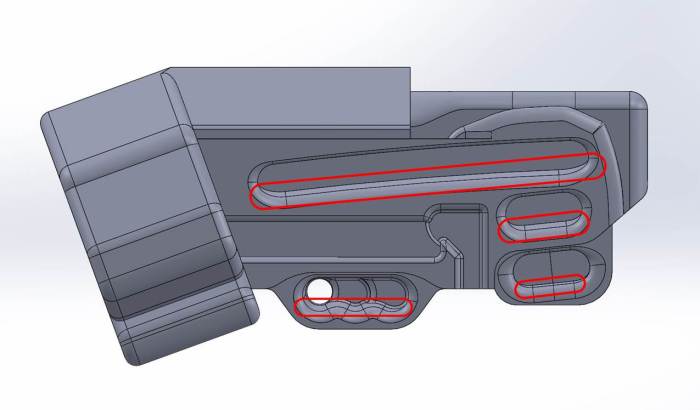 CAD model of the Forge. The draft that was added to all of the pockets is apparent in this screen capture, indicated by the extra line at the bottom of each pocket (and circled in red).