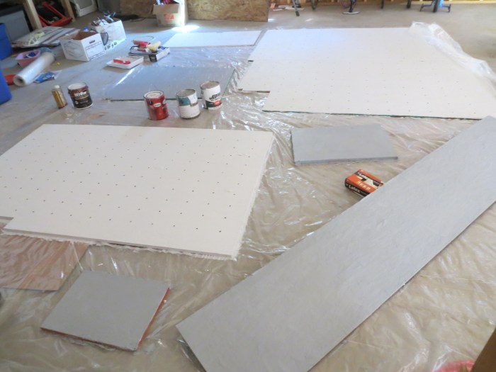 Painting panels. I had a bunch of scrap OSB lying around, and I really wanted to maximize re-use instead of scrapping it and buying new sheets. In the end I only had to buy one new panel (but lots of paint).