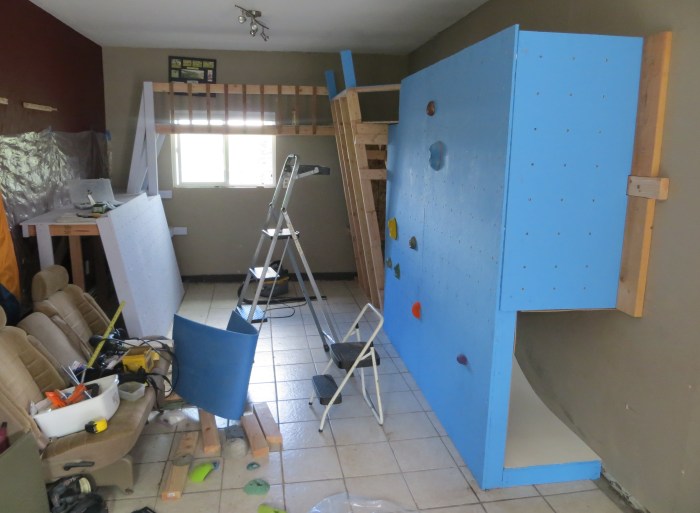 Installing panels. From L to R, the wall angles are 80 degrees, 100 degrees, and vert.