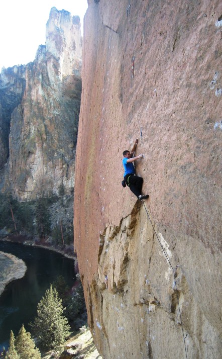 Fred Gomez cool and collected on his send of Smooth Boy, 13b, Smith Rock, OR.