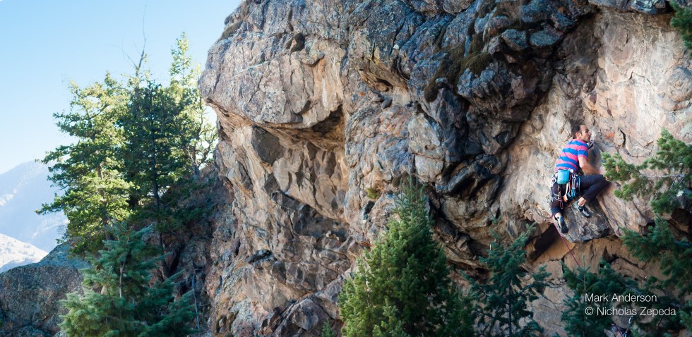 Just after topping out the crux mantle of Aftermathematics, 5.12a. Photo Nicholas Zepeda.